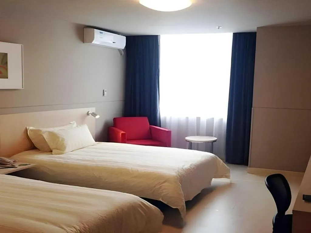 Bed in Jinjiang Inn Ningbo Airport Outlets Plaza