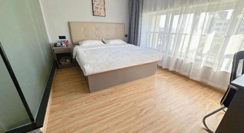 Bed in GreenTree Inn Huaian Lianshui Jindi International Garden Business Hotel