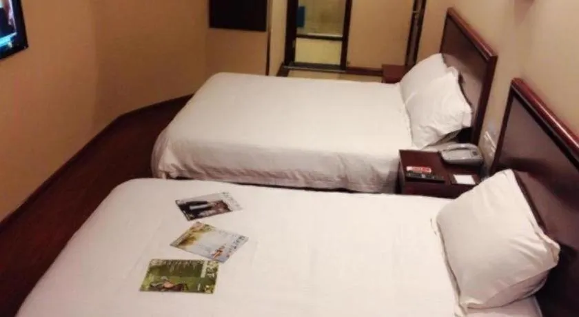 Bed in GreenTree Inn Huaian Lianshui Jindi International Garden Business Hotel