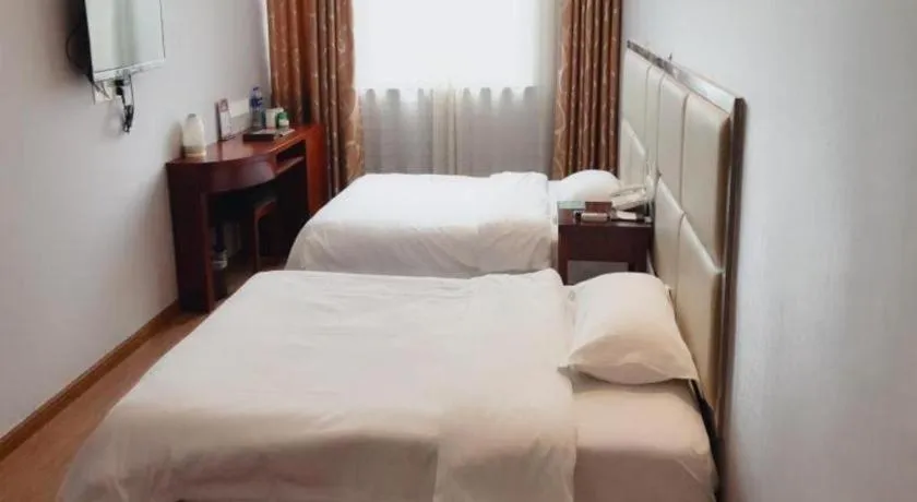 Bed in GreenTree Inn Huaian Lianshui Jindi International Garden Business Hotel