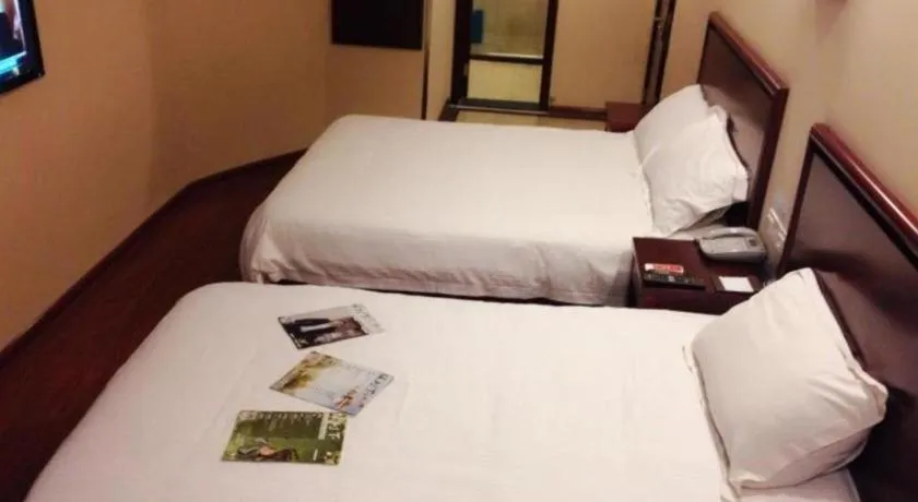 Bed in GreenTree Inn Huaian Lianshui Jindi International Garden Business Hotel