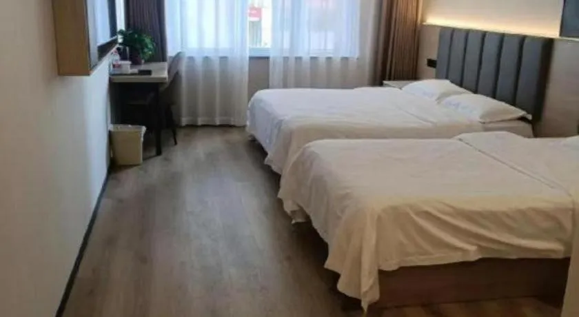 Bed in GreenTree Inn Huaian Lianshui Jindi International Garden Business Hotel