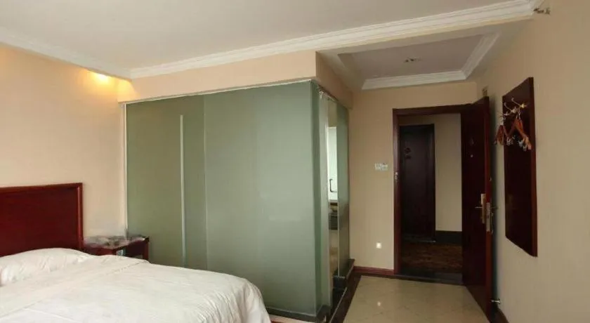 Bed in GreenTree Inn Huaian Lianshui Jindi International Garden Business Hotel