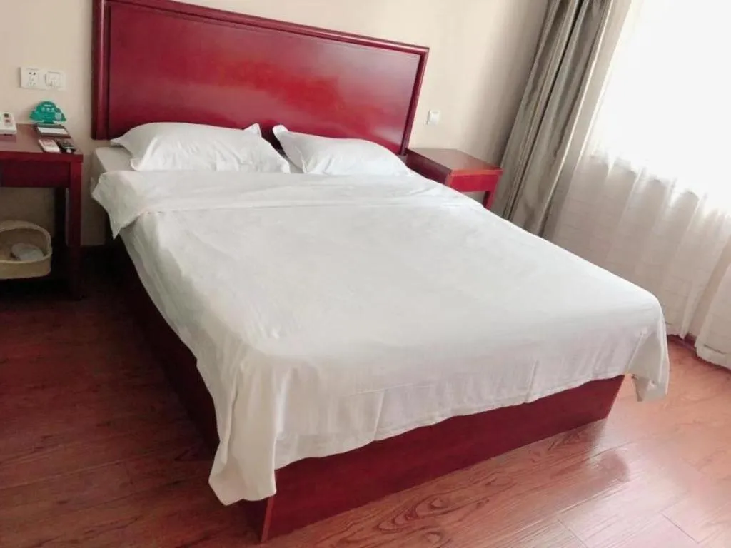 Bed in GreenTree Inn Huaian Lianshui Jindi International Garden Business Hotel