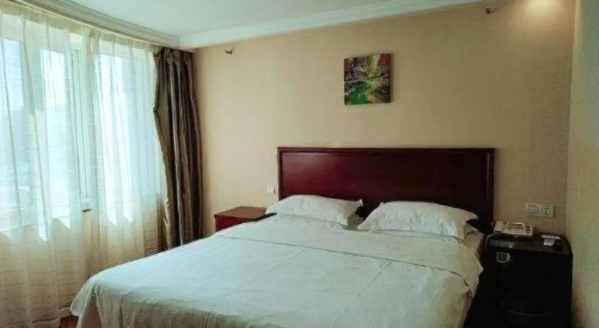 Bed in GreenTree Inn Huaian Lianshui Jindi International Garden Business Hotel
