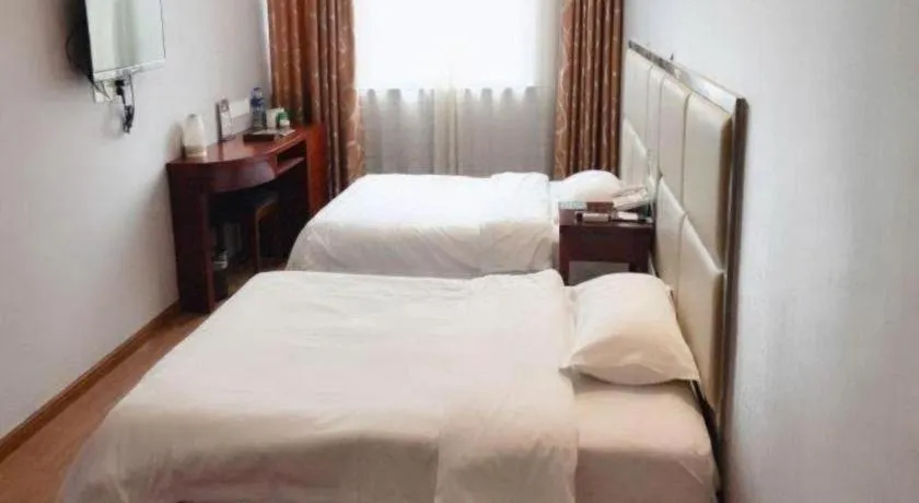 Bed in GreenTree Inn Huaian Lianshui Jindi International Garden Business Hotel
