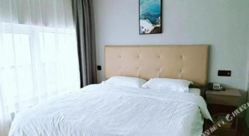 Bed in GreenTree Inn Huaian Lianshui Jindi International Garden Business Hotel