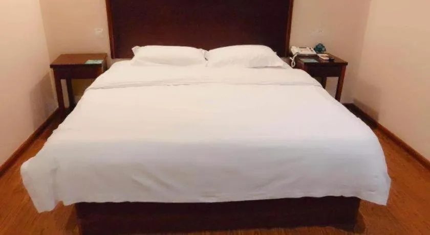 Bed in GreenTree Inn Huaian Lianshui Jindi International Garden Business Hotel