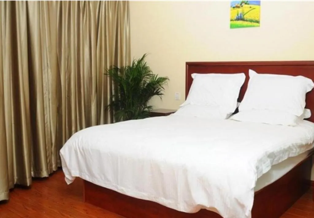 Bed in GreenTree Inn Huaian Lianshui Jindi International Garden Business Hotel