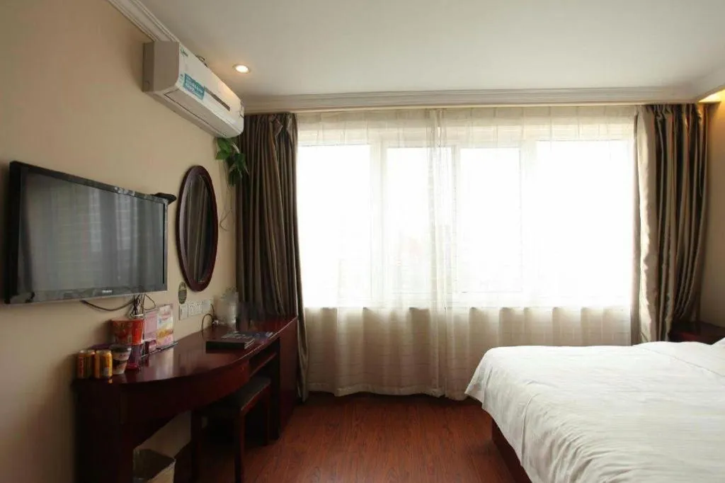 Bed in GreenTree Inn Huaian Lianshui Jindi International Garden Business Hotel