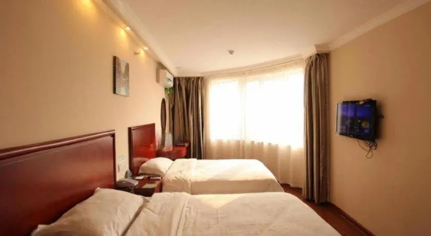 Bed in GreenTree Inn Huaian Lianshui Jindi International Garden Business Hotel