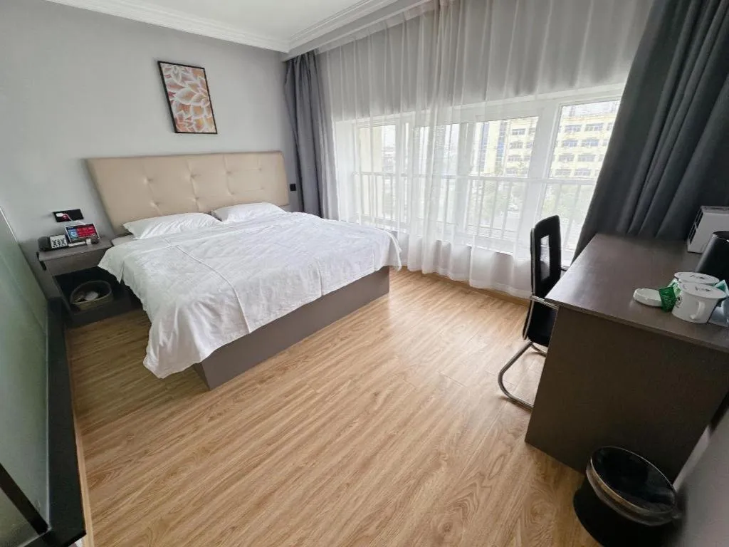 Bed in GreenTree Inn Huaian Lianshui Jindi International Garden Business Hotel