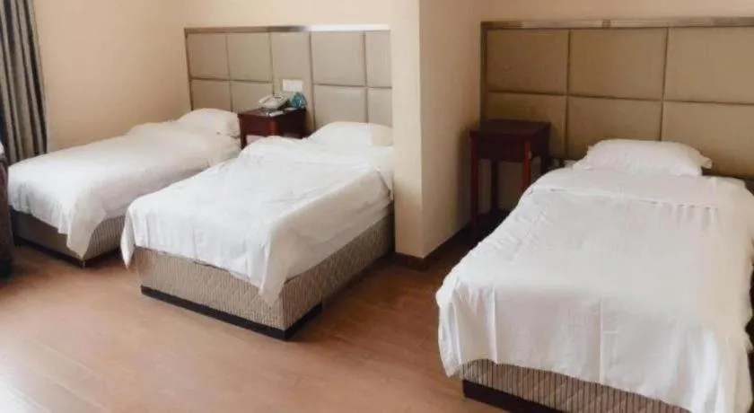 Bed in GreenTree Inn Huaian Lianshui Jindi International Garden Business Hotel
