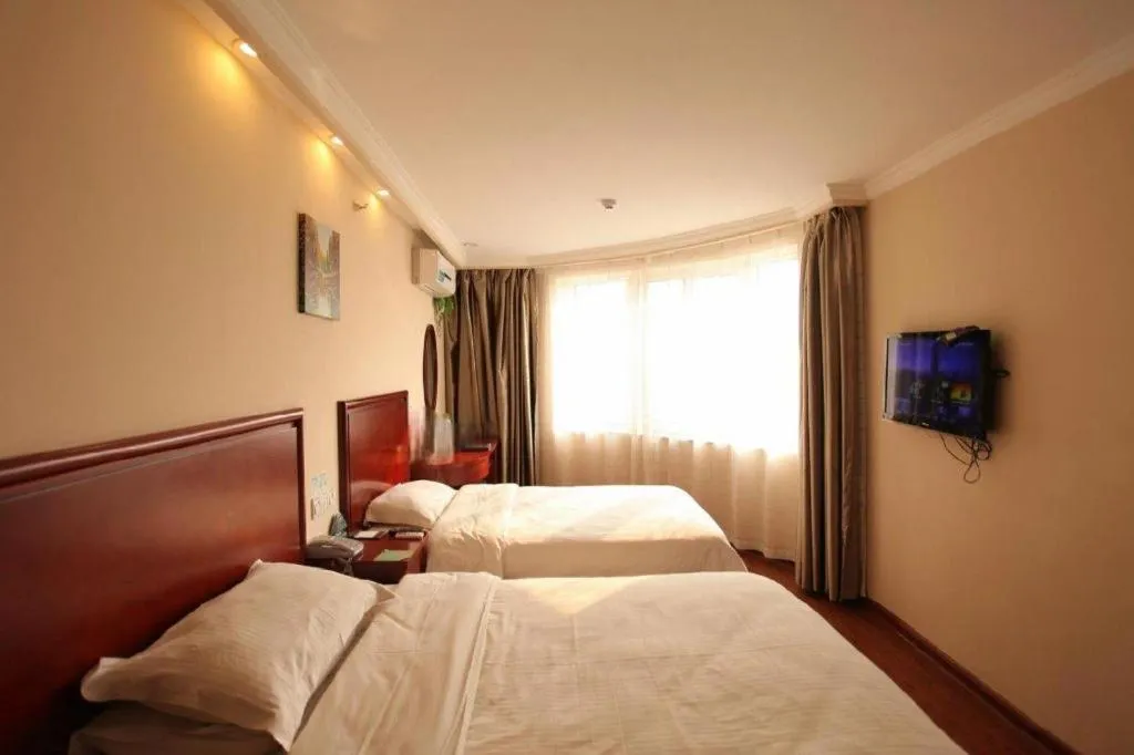 Bed in GreenTree Inn Huaian Lianshui Jindi International Garden Business Hotel