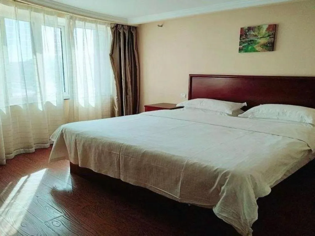 Bed in GreenTree Inn Huaian Lianshui Jindi International Garden Business Hotel