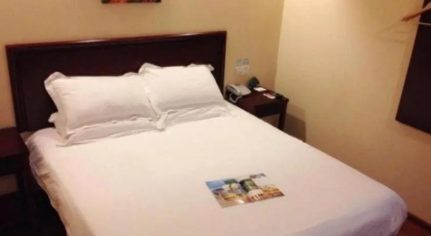 Bed in GreenTree Inn Huaian Lianshui Jindi International Garden Business Hotel