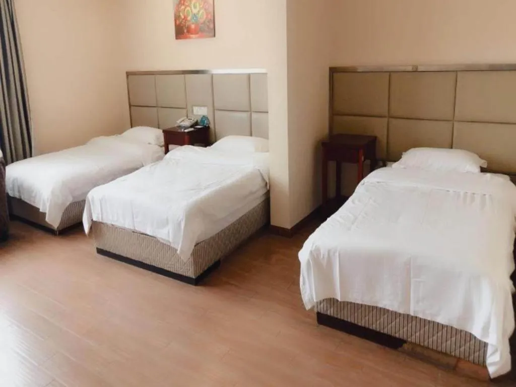 Bed in GreenTree Inn Huaian Lianshui Jindi International Garden Business Hotel