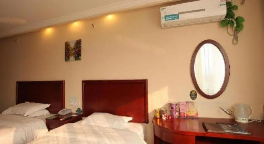 Bed in GreenTree Inn Huaian Lianshui Jindi International Garden Business Hotel