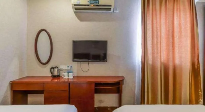 Bed in GreenTree Inn Shanghai South Railway Station Xujiahui Stadium Subway Station Shell Hotel