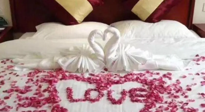 Bed in GreenTree Inn Shanghai South Railway Station Xujiahui Stadium Subway Station Shell Hotel