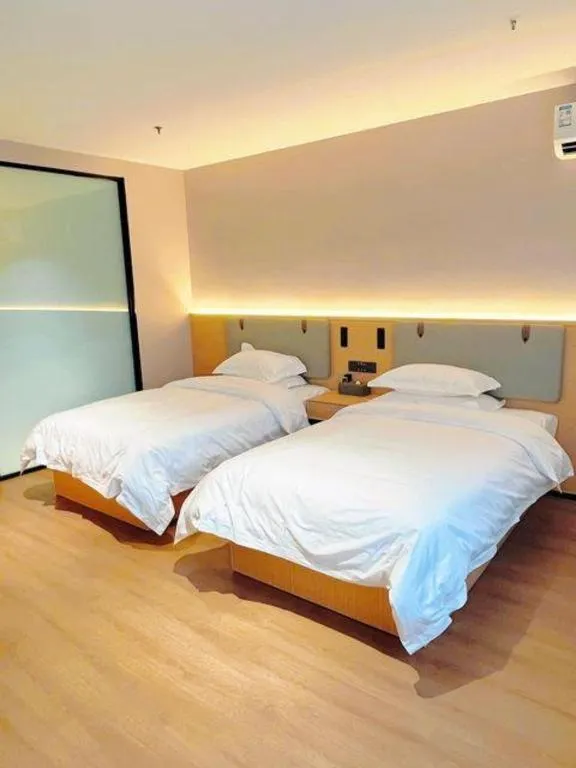 Bed in GreenTree Inn Wuxi Changjiang North Road Jincheng Road Express Hotel
