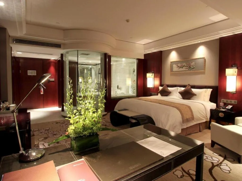 Bed in Zhangjiagang Zhonglian GDH International Hotel