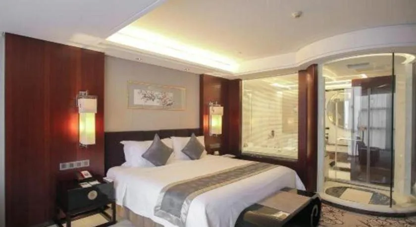 Bed in Zhangjiagang Zhonglian GDH International Hotel