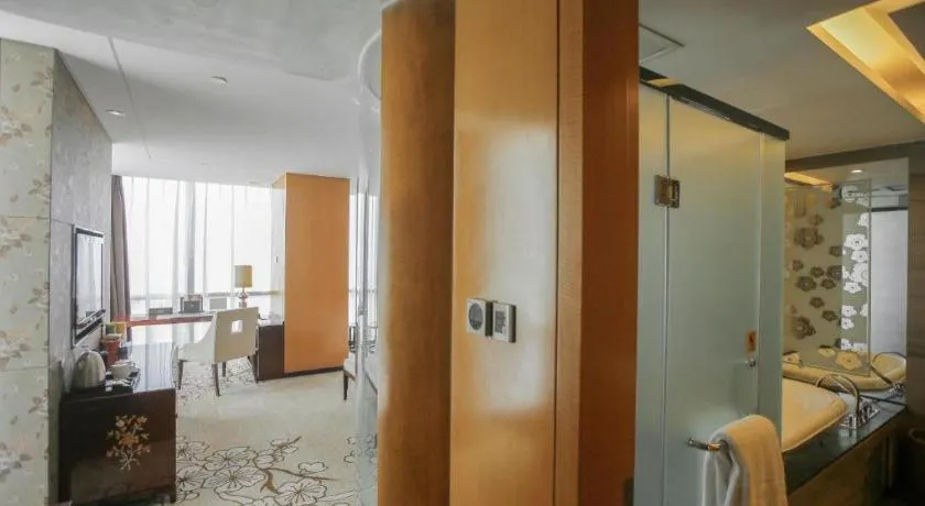 Bed in Zhangjiagang Zhonglian GDH International Hotel