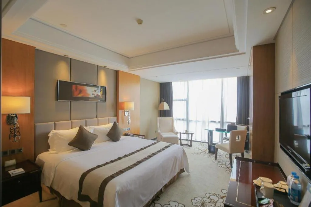 Bed in Zhangjiagang Zhonglian GDH International Hotel