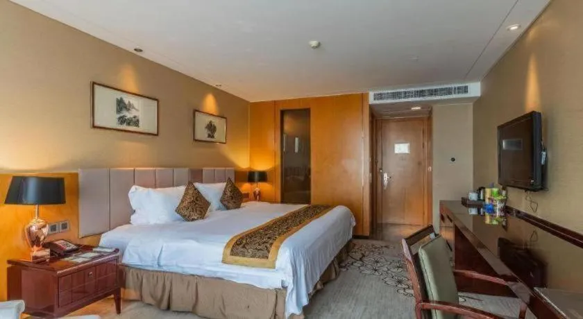 Bed in Zhangjiagang Zhonglian GDH International Hotel