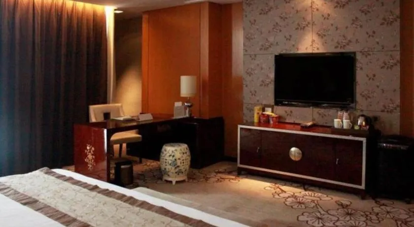 Bed in Zhangjiagang Zhonglian GDH International Hotel