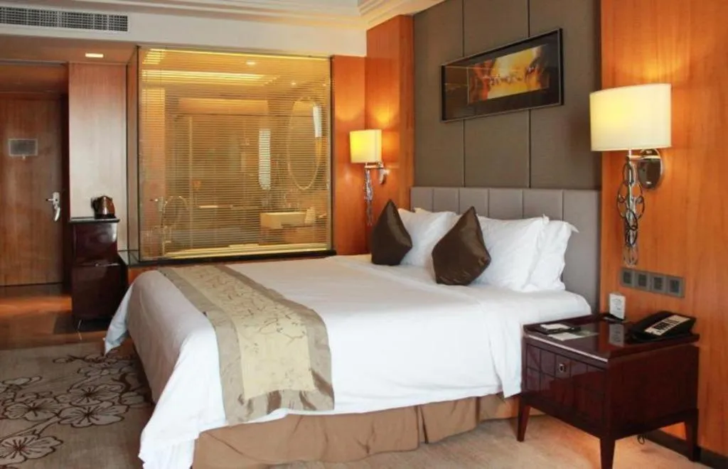 Bed in Zhangjiagang Zhonglian GDH International Hotel