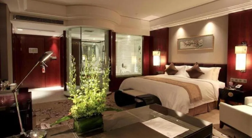 Bed in Zhangjiagang Zhonglian GDH International Hotel