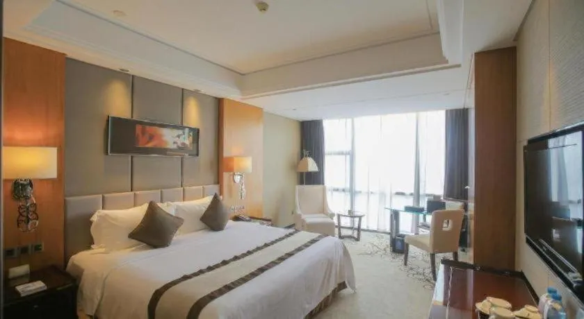 Bed in Zhangjiagang Zhonglian GDH International Hotel