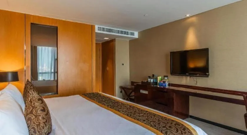 Bed in Zhangjiagang Zhonglian GDH International Hotel