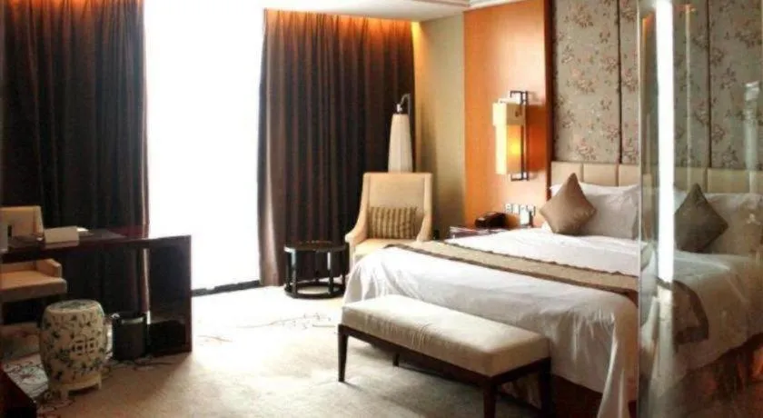 Bed in Zhangjiagang Zhonglian GDH International Hotel