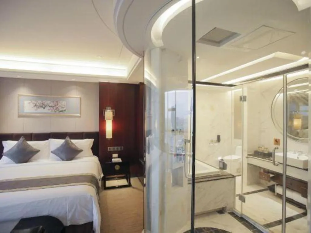 Bed in Zhangjiagang Zhonglian GDH International Hotel