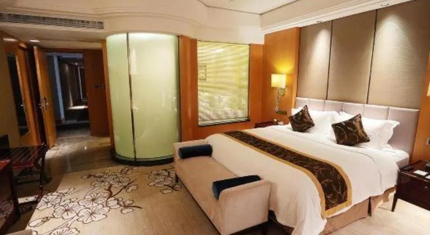 Bed in Zhangjiagang Zhonglian GDH International Hotel