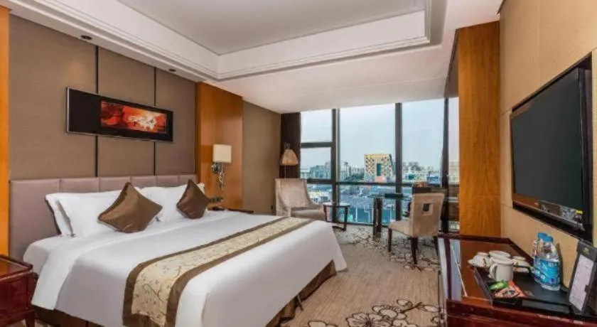 Bed in Zhangjiagang Zhonglian GDH International Hotel