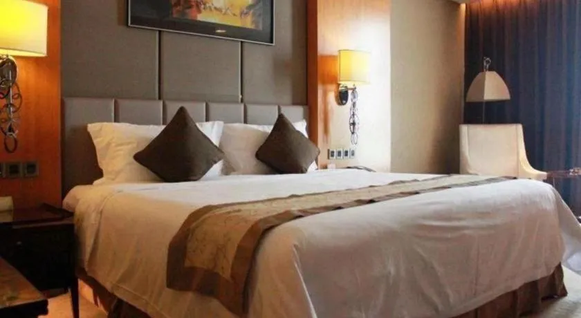 Bed in Zhangjiagang Zhonglian GDH International Hotel