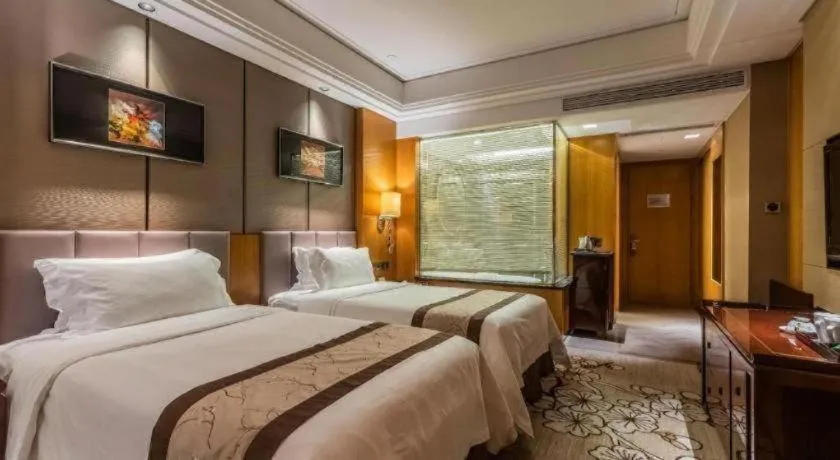 Bed in Zhangjiagang Zhonglian GDH International Hotel