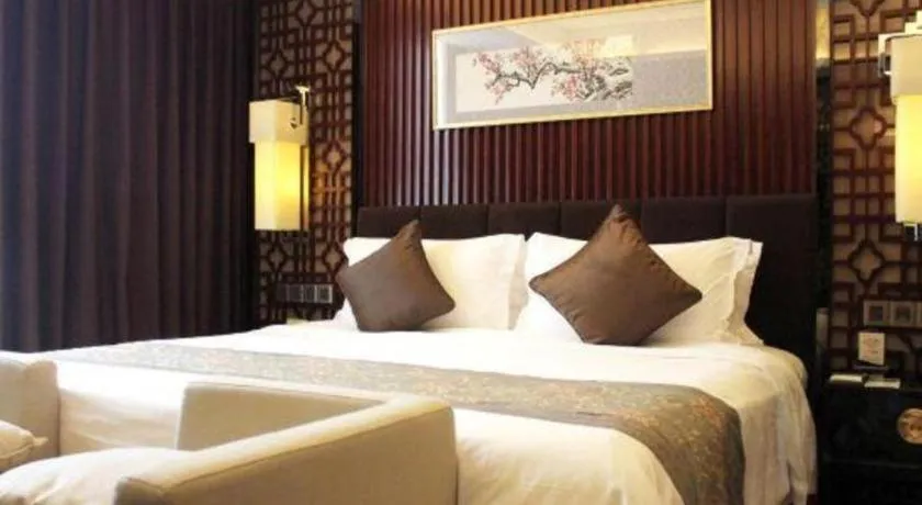 Bed in Zhangjiagang Zhonglian GDH International Hotel