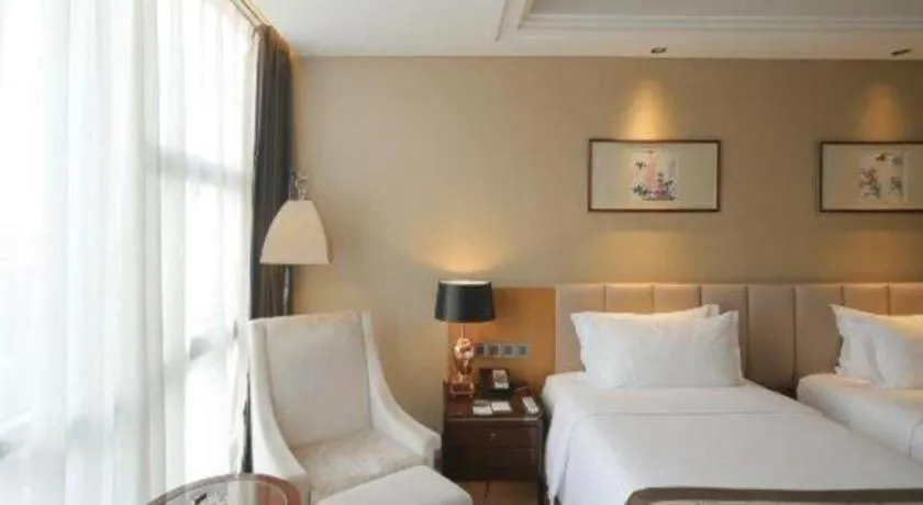 Bed in Zhangjiagang Zhonglian GDH International Hotel