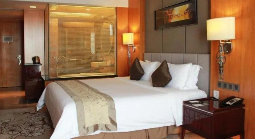 Bed in Zhangjiagang Zhonglian GDH International Hotel