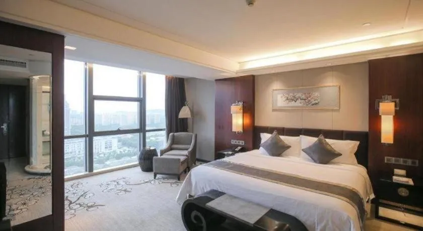 Bed in Zhangjiagang Zhonglian GDH International Hotel