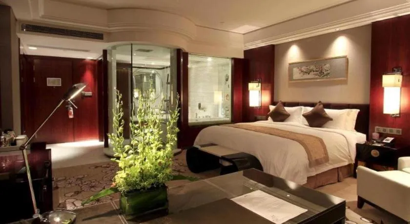 Bed in Zhangjiagang Zhonglian GDH International Hotel