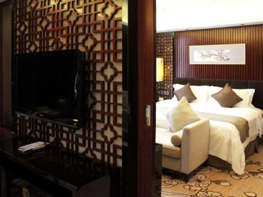 Bed in Zhangjiagang Zhonglian GDH International Hotel