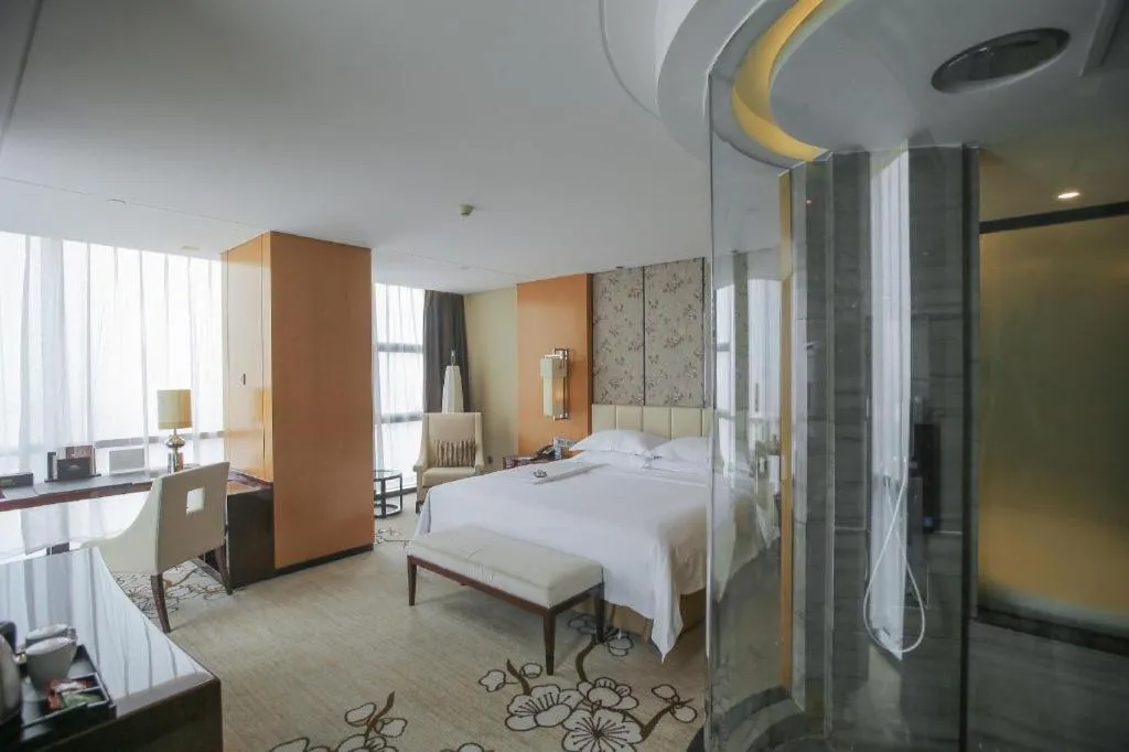 Bed in Zhangjiagang Zhonglian GDH International Hotel