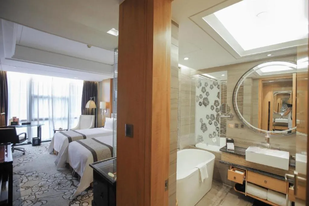 Bed in Zhangjiagang Zhonglian GDH International Hotel