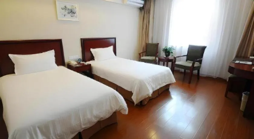 Bed in GreenTree Inn Shanghai Changxing Island Yuansha Fishing Port Hotel